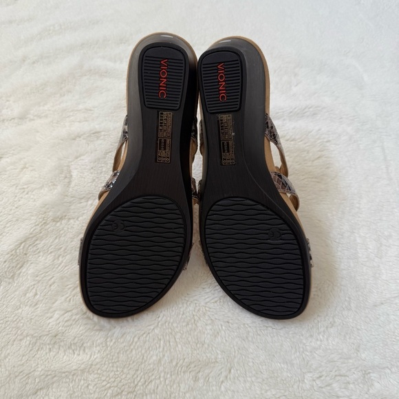 Vionic Orthotic Adjustable Triple Strap Slide
Wedges in Radia Snake Size 7 - Picture 7 of 7